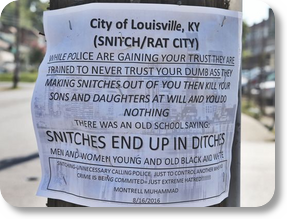 Dad of slain rapper upset by 'snitch' fliers PHOTO