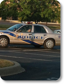 LMPD trying to identify officer photographed apparently sleeping in car PHOTO