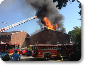 Three people rescued from apartment fire, LMPD officer injured PHOTO