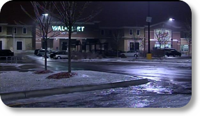 Officer fires shots at car in store parking lot PHOTO
